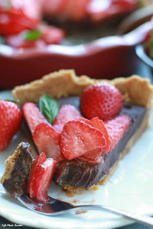 No-Bake Strawberry Chocolate Ganache Tart makes an easy & decadent dessert perfect for summer gatherings.