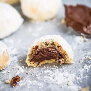 Nutella Stuffed Snowball Cookies are perfect for your Christmas cookie tray!