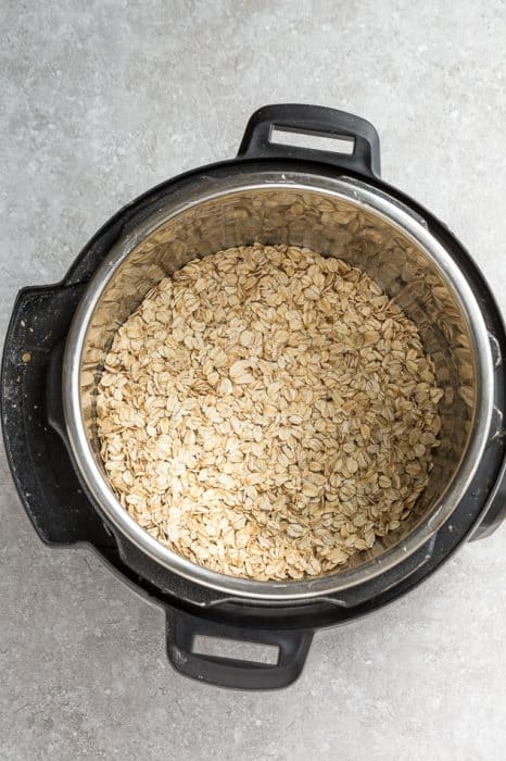 Rolled oats inside of an instant pot sitting on a kitchen counter