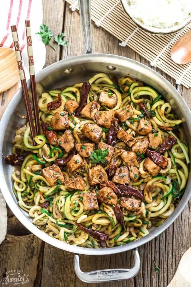 Top view of Kung Pao Chicken Zoodles {Zucchini Noodles} in a skillet with chopsticks