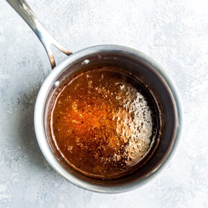 Orange sauce in a pot