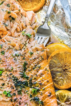 Baked Orange Sesame Salmon in Foil - is the perfect easy and healthy weeknight recipe. Best of all, the salmon is cooked to tender, flaky perfection in just 30 minutes with a flavorful orange sesame glaze.