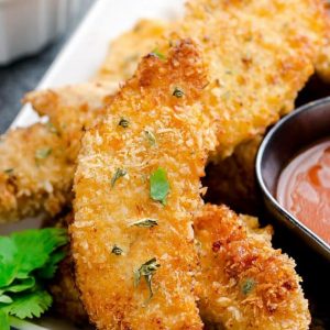 Oven baked chicken tenders on a plate