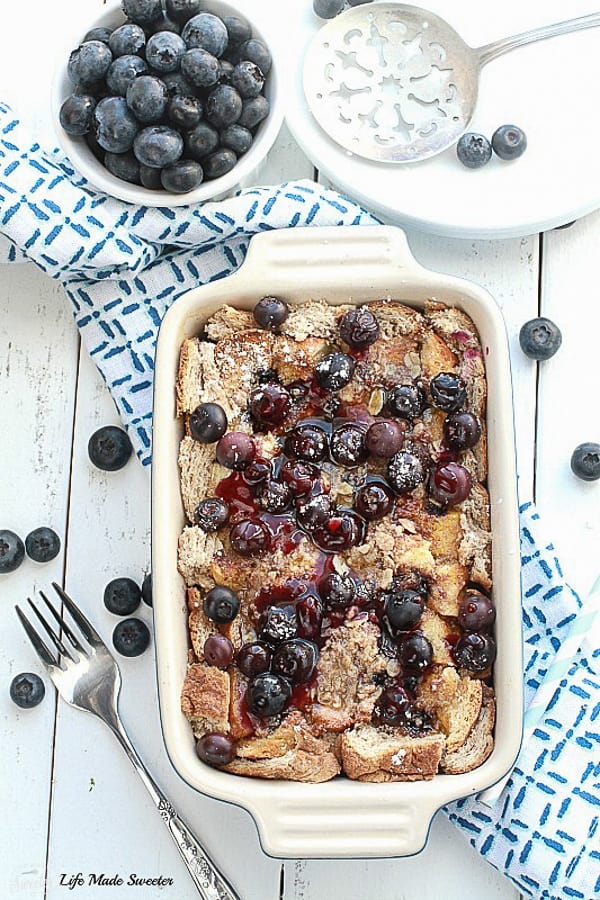 Overnight Blueberry Cream Cheese French Toast Bake - An easy and delicious baked French Toast bursting with blueberries and cream cheese. Perfect for breakfast, brunch or even dinner and best of all, so easy to assemble the night before!