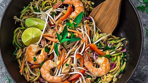This recipe for Pad Thai Zucchini Noodles (Zoodles) is the perfect easy 30 minute one pan stir-fry meal. Best of all, it's full of all the authentic flavors of the popular restaurant favorite in a grain free version. So delicious and way better and healthier than takeout! Great for Sunday meal prep and packing into school and work lunchboxes and lunch bowls.