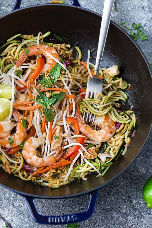 This recipe for Pad Thai Zucchini Noodles (Zoodles) is the perfect easy 30 minute one pan stir-fry meal. Best of all, it's full of all the authentic flavors of the popular restaurant favorite in a grain free version. So delicious and way better and healthier than takeout! Great for Sunday meal prep and packing into school and work lunchboxes and lunch bowls.