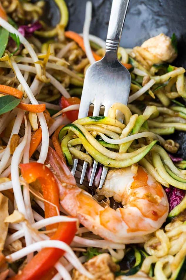 This recipe for Pad Thai Zucchini Noodles (Zoodles) is the perfect easy 30 minute one pan stir-fry meal. Best of all, it's full of all the authentic flavors of the popular restaurant favorite in a grain free version. So delicious and way better and healthier than takeout! Great for Sunday meal prep and packing into school and work lunchboxes and lunch bowls.