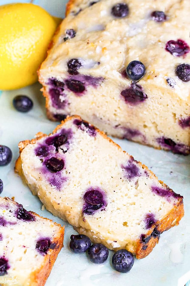 Front view of sliced blueberry bread with lemon.