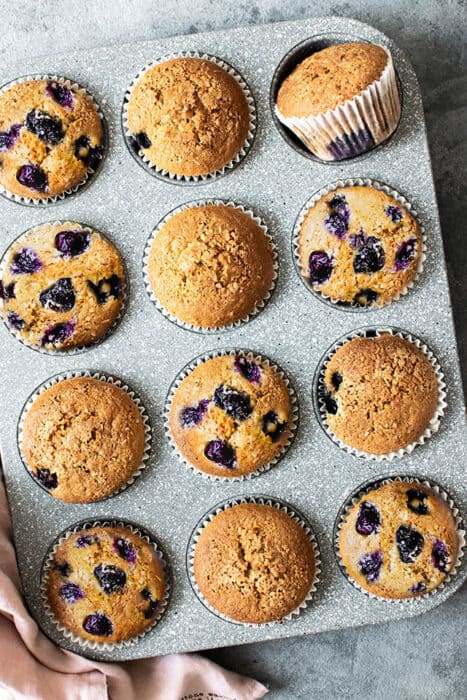 Top view of 12 keto blueberry muffins in a muffin pan