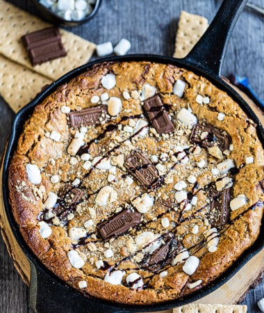 Top view of a s'mores cookie skillet in a cast iron pan