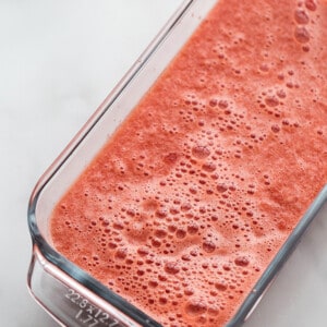 Top view of blended healthy watermelon sorbet in a clear loaf pan