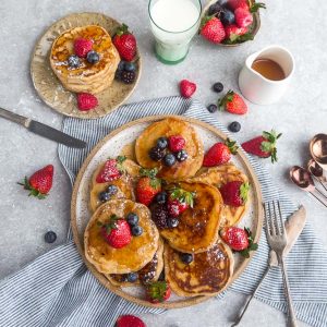 Low Carb Pancakes - soft and fluffy pancakes that are grain free and keto-friendly. Bursting with fresh berries, it's the perfect low carb breakfast!