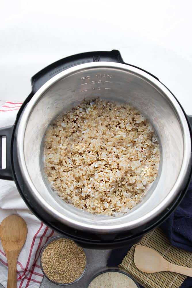 The Inner Pot of an Instant Pot Filled with Brown Rice