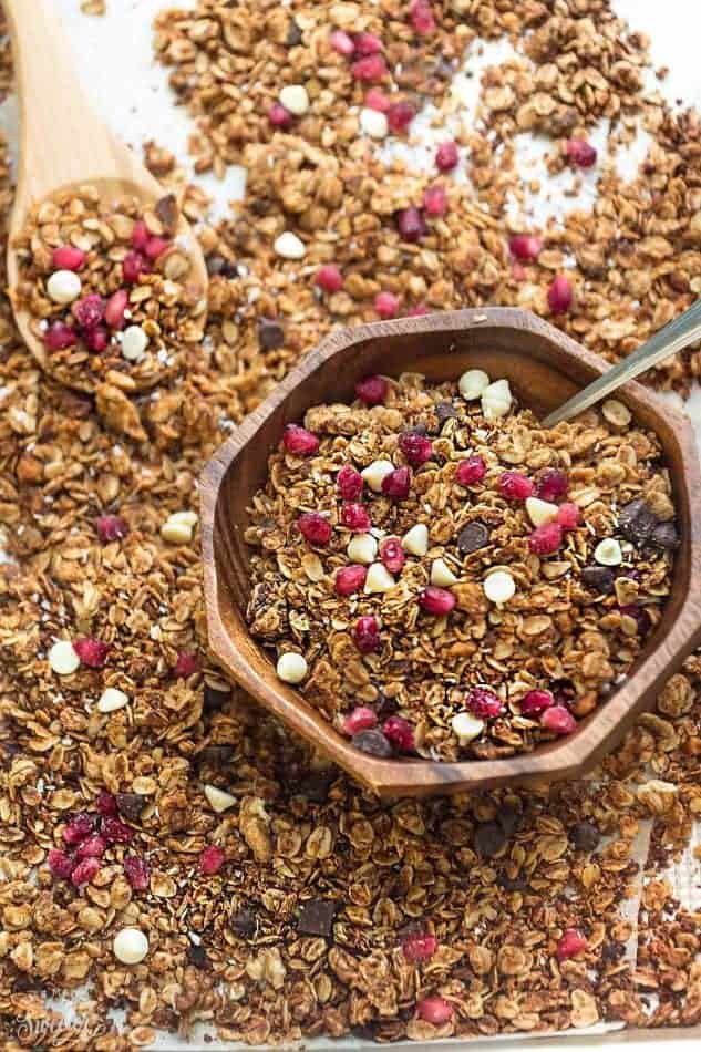 Pomegrante White Chocolate Granola makes the perfect holiday snack or breakfaast! Best of all, it's so easy to make and full of big crunchy clusters!