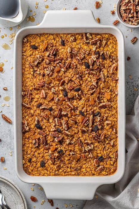 A Pumpkin Baked Oatmeal in a Large White Pan Shown From the Top