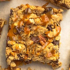 Pumpkin Carmelitas are the easy treat for fall. Best of all, they're soft, chewy and full of delicious layers of oatmeal, pumpkin, pumpkin spice, chocolate and gooey caramel. Great for bringing along to dessert bars or any potluck or parties.