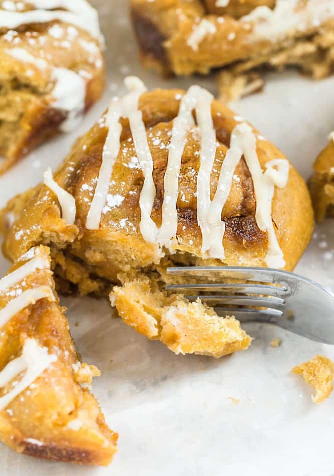 Pumpkin Cinnamon Rolls make the perfect indulgent breakfast or brunch. They're soft, fluffy and made completely from scratch. The best part is, how easy you will fall in love after one bite and even better how amazing your house will smell while these delicious rolls bake in your oven!