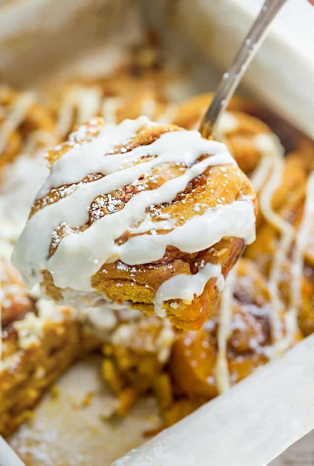 Pumpkin Cinnamon Rolls make the perfect indulgent breakfast or brunch. They're soft, fluffy and made completely from scratch. The best part is, how easy you will fall in love after one bite and even better how amazing your house will smell while these delicious rolls bake in your oven!