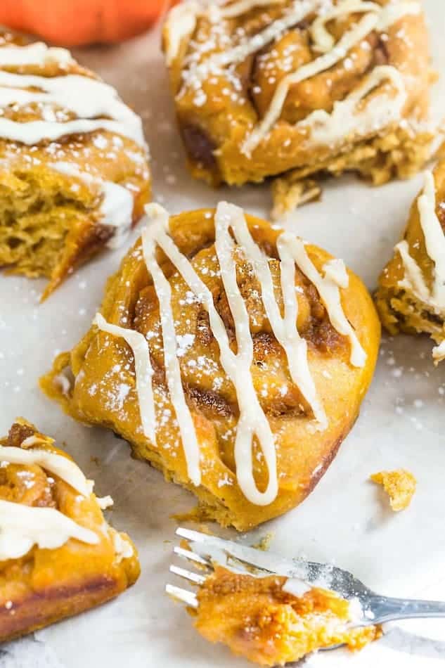 Pumpkin Cinnamon Rolls make the perfect indulgent breakfast or brunch. They're soft, fluffy and made completely from scratch. The best part is, how easy you will fall in love after one bite and even better how amazing your house will smell while these delicious rolls bake in your oven!