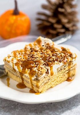 No Bake Pumpkin Icebox Cake makes the perfect make ahead fall dessert. Best of all, takes just minutes to whip up and full of cozy fall flavors! Made with layers of graham crackers and pumpkin cream cheese mousse. A delicious dessert for holiday parties and get togethers and much easier to bring than a pumpkin pie.