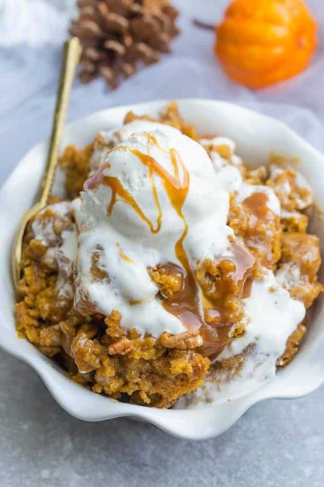 Pumpkin Pudding Cake - the perfect easy dessert for fall. Best of all, comes together easily in just one bowl with less than 15 minutes of prep time. Full of cozy warm pumpkin pie spices, cinnamon and gooey pumpkin. It's like a crossover between a lava cake and pumpkin pie - so soft, moist and delicious! Perfect for Thanksgiving and fall gatherings, parties or get togethers.