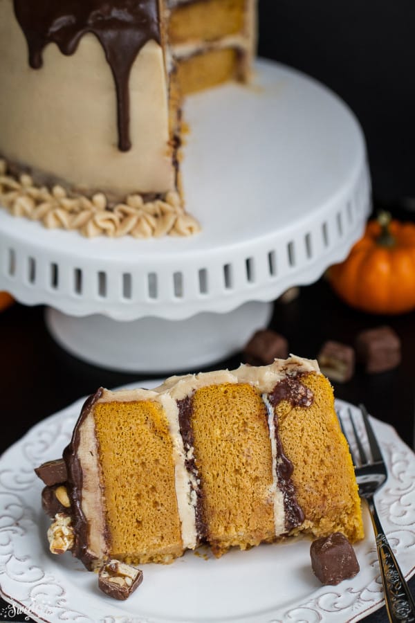 Pumpkin Snickers Layer Cake with Salted Caramel Frosting makes an impressive dessert for any occasion