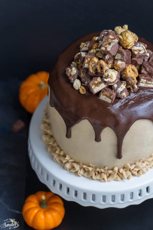 Pumpkin Snickers Layer Cake with Salted Caramel Frosting makes an impressive dessert for any occasion