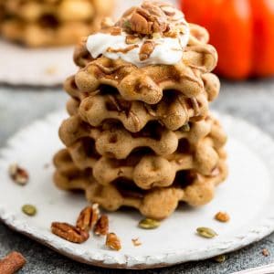 Keto Pumpkin Waffles – thick and fluffy low carb waffles make the perfect healthy breakfast or brunch for fall, Thanksgiving, Halloween or any weekend. Best of all, this gluten free recipe is also paleo, sugar free and grain free and comes together easily in just one bowl.