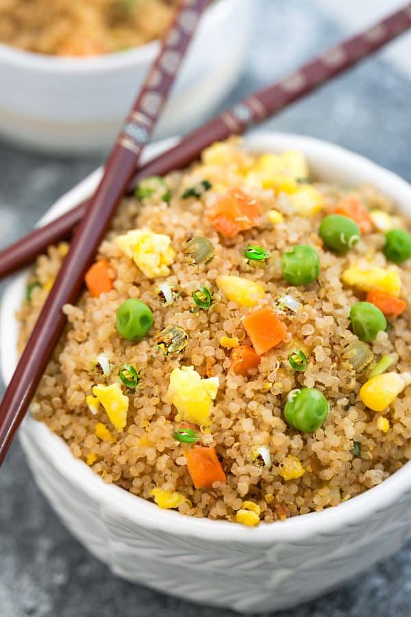 Quinoa Fried Rice makes a simple and healthy alternative to traditional fried rice. Full of protein and vegetables and just perfect for busy weeknights. Best of all, instructions included to make it in your Instant Pot pressure cooker or on the stove!