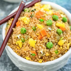 Quinoa Fried Rice makes a simple and healthy alternative to traditional fried rice. Full of protein and vegetables and just perfect for busy weeknights. Best of all, instructions included to make it in your Instant Pot pressure cooker or on the stove!