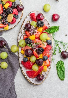 Easy Fruit Salad - a quick and healthy snack, breakfast, side dish or dessert! Made with fresh, seasonal fruit and a simple dressing made with lime juice and honey.