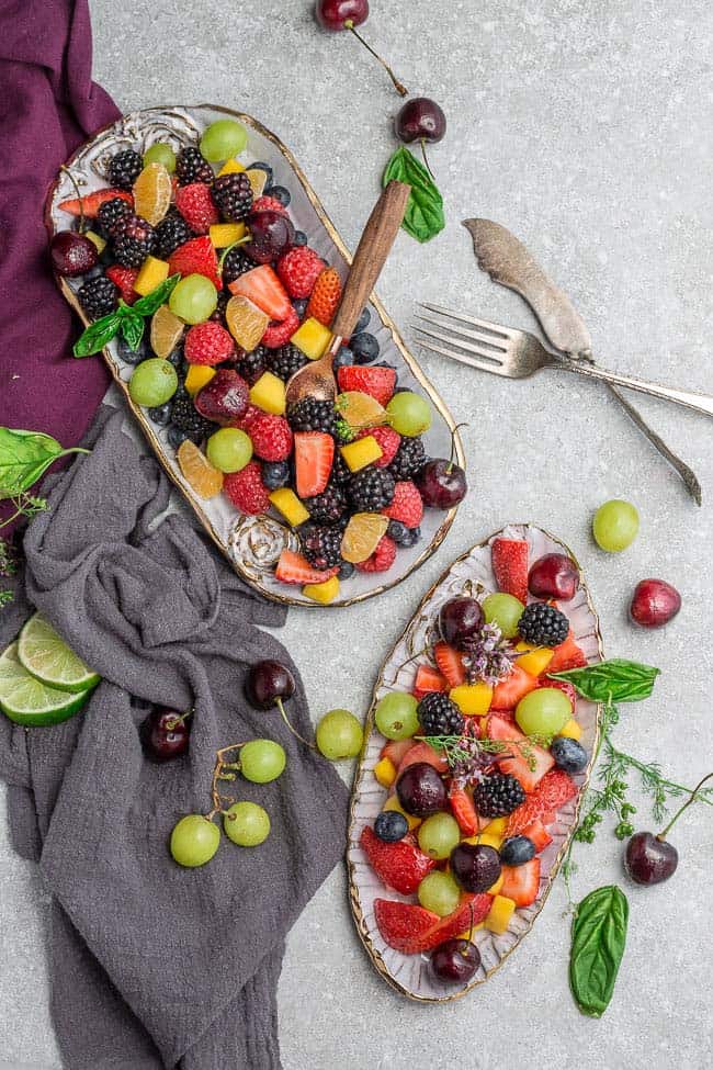 Easy Fruit Salad - a quick and healthy snack, breakfast, side dish or dessert! Made with fresh, seasonal fruit and a simple dressing made with lime juice and honey.