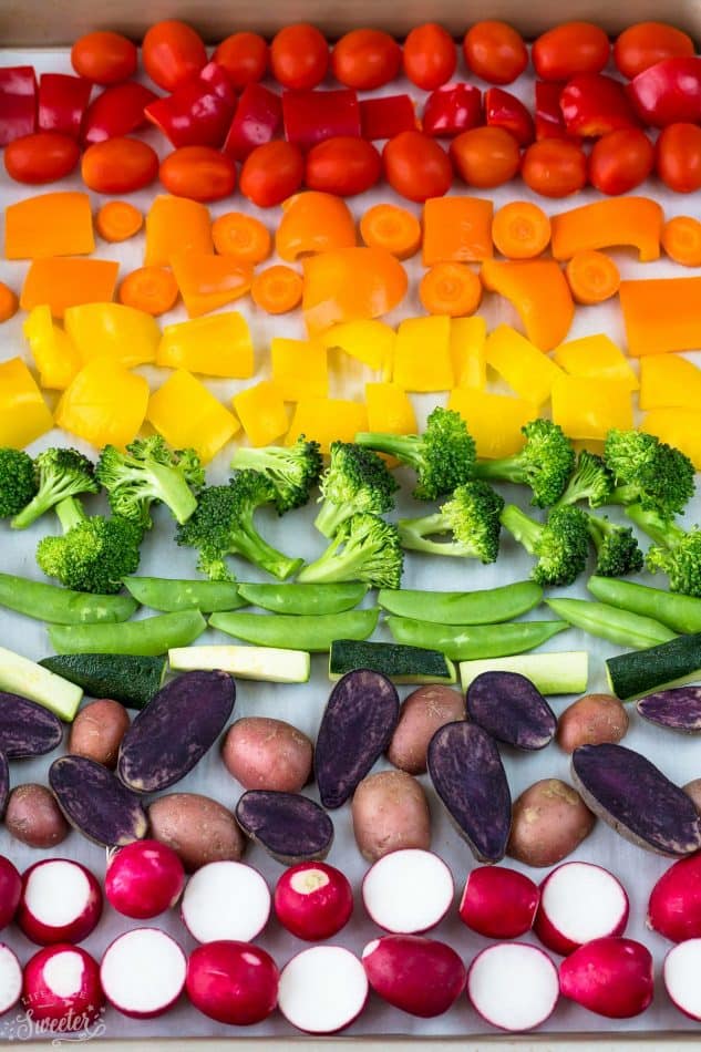 Rainbow Vegetables prepped for roasting on a sheet pan