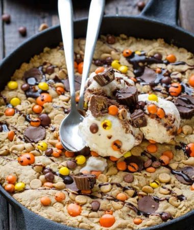 Reese's Peanut Butter Skillet Cookie is soft, chewy & makes the perfect treat to share with a crowd!