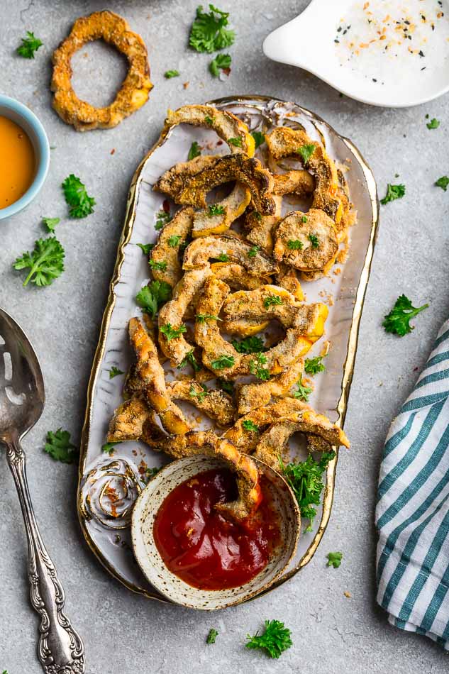 Delicata Fries on a platter with Whole30 ketchup garnished with parsley