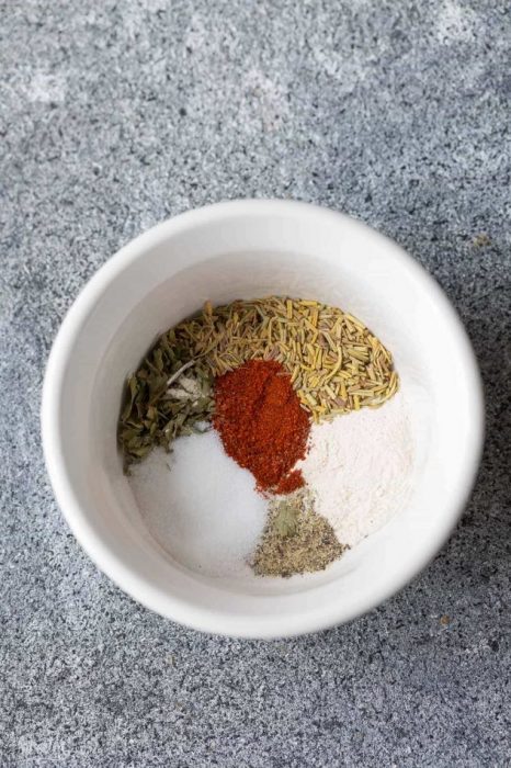 Top view of several spices in a small bowl