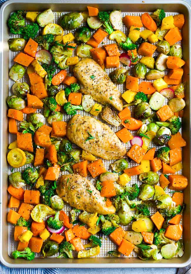 Sheet Pan Harvest Chicken with Vegetables - an easy complete one pan meal with low carb autumn vegetables perfect for fall. Made with tender and juicy with Brussels sprouts, pumpkin, broccoli and yellow zucchini. Keto, paleo, gluten free and Whole 30 compliant.