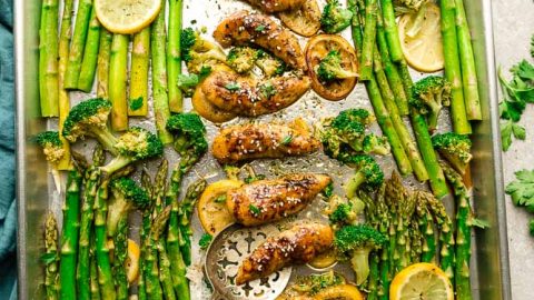 Sheet Pan Honey Lemon Chicken - the perfect easy meal for busy weeknights. Best of all, made with tender and juicy chicken, asparagus coated in a sweet and savory sauce.