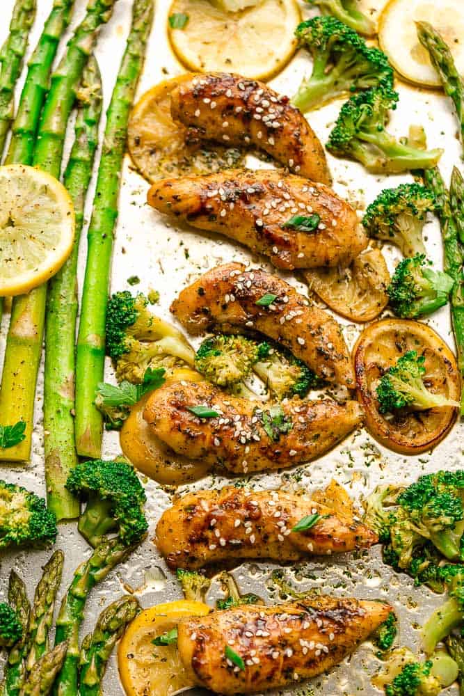 Sheet Pan Honey Lemon Chicken - the perfect easy meal for busy weeknights. Best of all, made with tender and juicy chicken, asparagus coated in a sweet and savory sauce. 