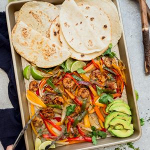 healthy sheet pan shrimp fajitas dinner with low carb tortillas