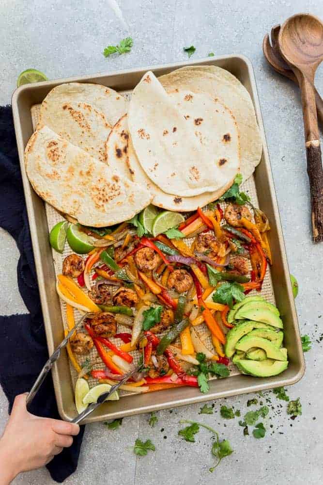 healthy sheet pan shrimp fajitas dinner with low carb tortillas