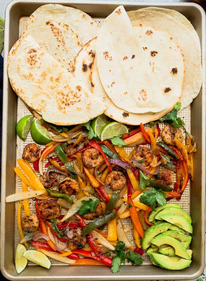 sheet pan meal of shrimp fajitas and low carb tortillas