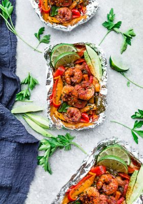 Shrimp Fajita Foil Packets - the perfect easy & healthy meal for summer grilling, camping and cookouts. Best of all, they’re loaded with all your favorite Tex Mex flavors and make a low carb, paleo and keto friendly meal.