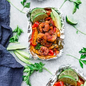 Shrimp Fajita Foil Packets - the perfect easy & healthy meal for summer grilling, camping and cookouts. Best of all, they’re loaded with all your favorite Tex Mex flavors and make a low carb, paleo and keto friendly meal.