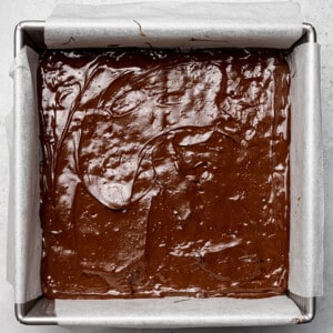 Top view of melted chocolate in a square baking pan