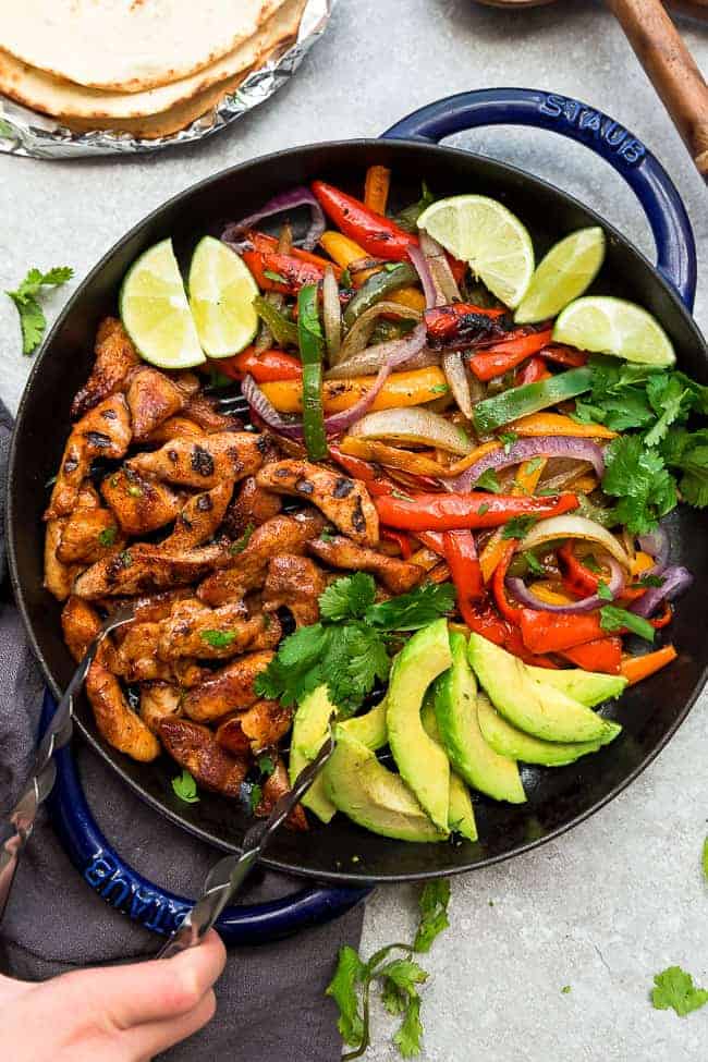 Top view of chicken fajita fillings in a skillet