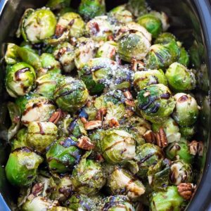 Slow Cooker Balsamic Brussels Sprouts plus 2 other holiday side dishes to help free up your oven. Recipes include Orange Ginger Glazed Carrots and Parmesan Sage Mashed Sweet Potatoes - easy dump and go recipes perfect for the holidays! Best of all, they're made entirely in your crock-pot with no oven or stove time!