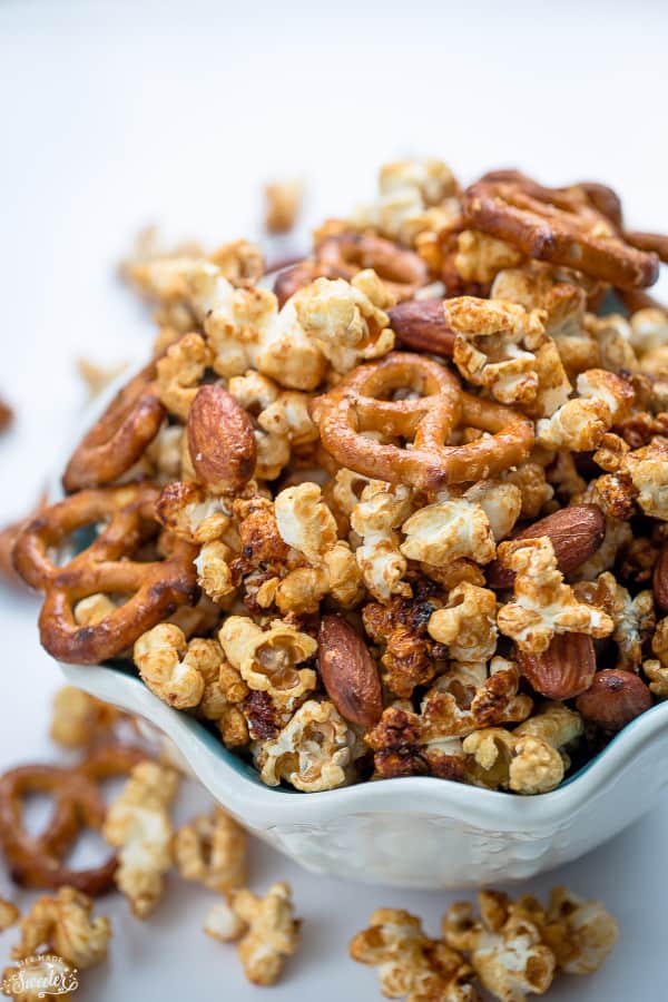 Slow Cooker Caramel Popcorn makes an easy and addictive snack