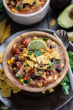 Overhead view of a bowl of Slow Cooker Chicken Enchilada Quinoa Soup
