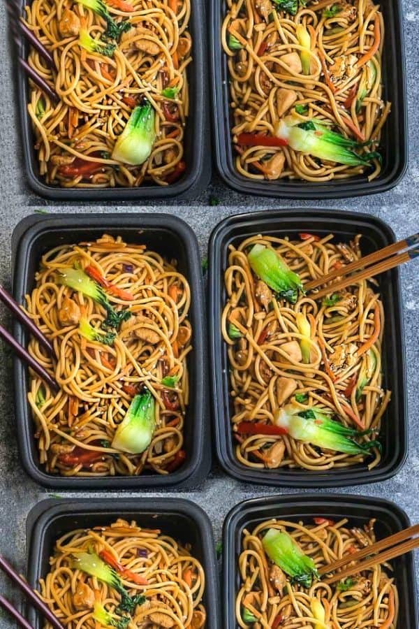 Top view of six meal prep containers of Crock pot Slow Cooker Chicken Lo Mein